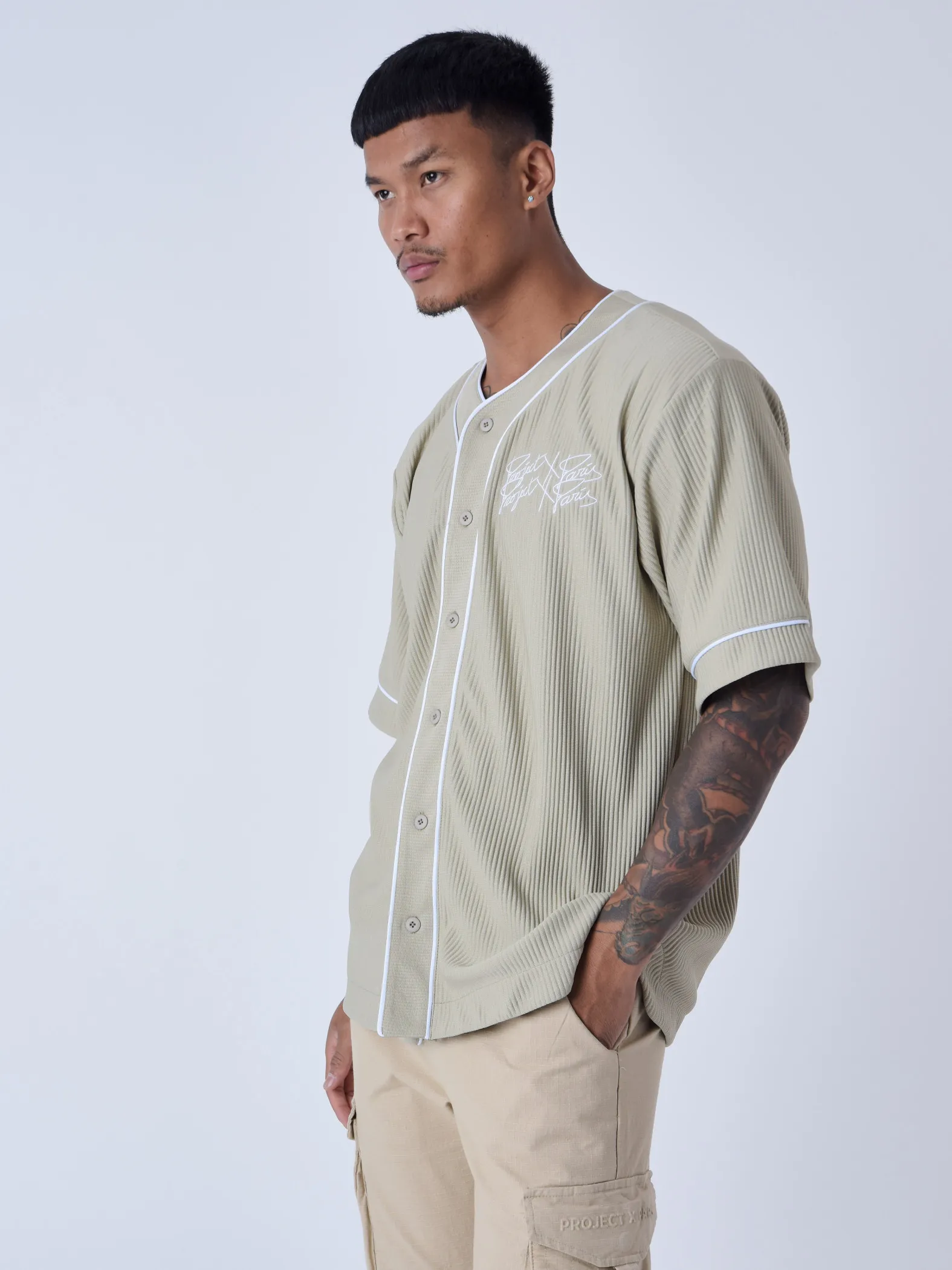 Camiseta de béisbol de material texturizado