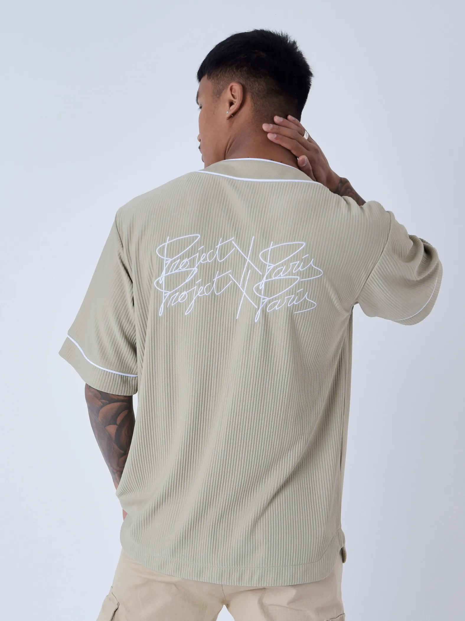 Camiseta de béisbol de material texturizado