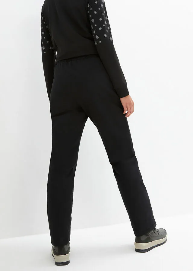 Pantalón térmico con forro polar, cintura cómoda, material impermeable y corte recto Negro