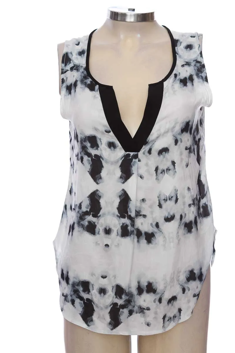 TOP / CAMISETA COLOR BLANCO  PUNTO BLANCO